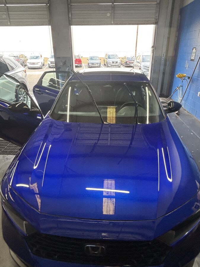 Detailed vehicle front end on showroom floor